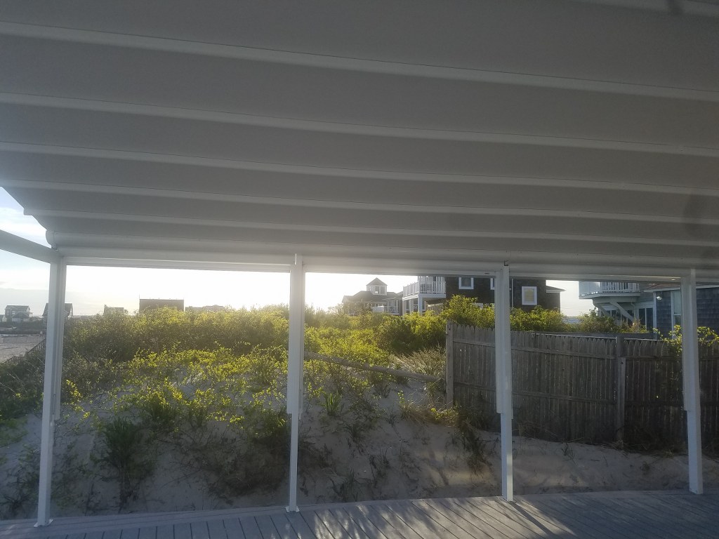Custom-Palladia-with-Clear-Vinyl-Screens-at-Galilee-Beach-Club-by-New-Haven-Awning-(3).jpg